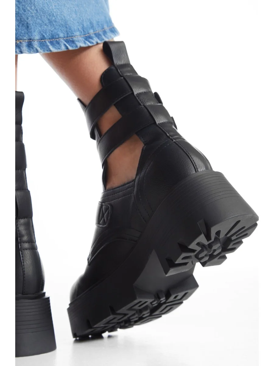 Botas con hebillas Marina Noir