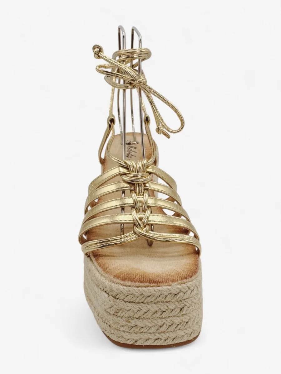 Sandalias con Tiras Atadas a la Pierna Nora Gold