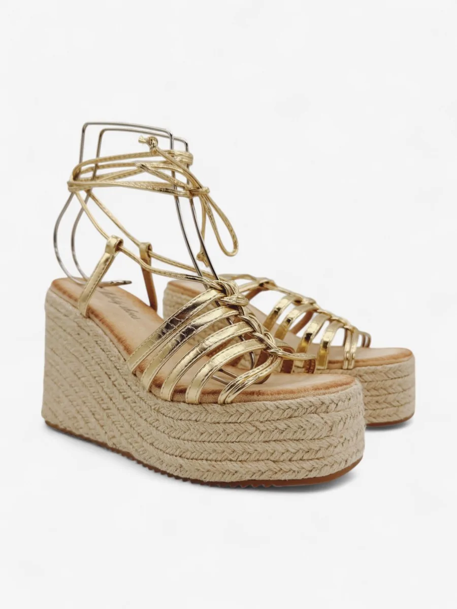 Sandalias con Tiras Atadas a la Pierna Nora Gold