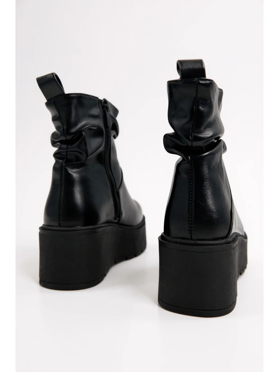 Botas con Plataforma Leno Noir