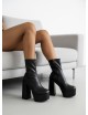 Botines con tacon y plataforma Vittoria Noir
