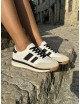 Tenis retro blancas rayas negras Fasano