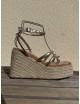 Sandalias con plataforma y tiras Telti Gold